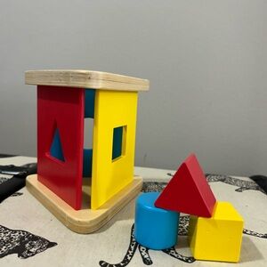 Wooden shape sorting toy